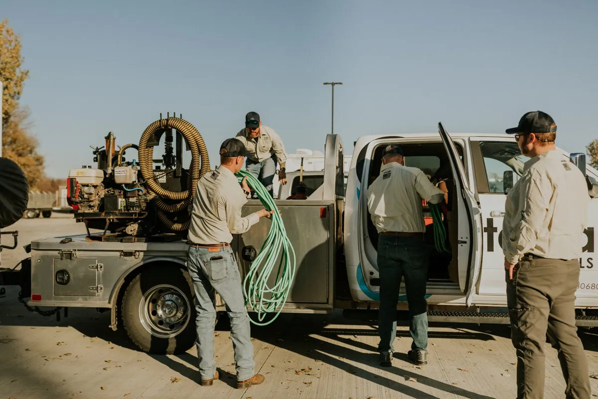Service team performing maintenance